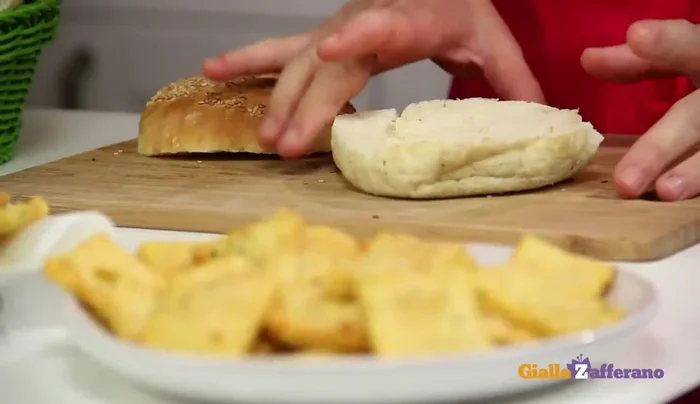 Serve the panelle in sesame seed buns. Leftover mixture can be pressed into a baking pan, cut into slices, fried, and served as a snack.