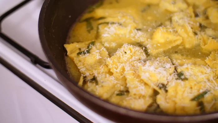 Combine and serve: Toss the cooked ravioli in the sauce. Garnish with parmesan cheese and serve immediately.