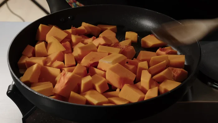 Add the pumpkin to the pan. Add extra water if needed.