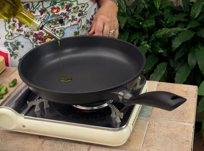 Heat olive oil in a pan over medium-high heat.
