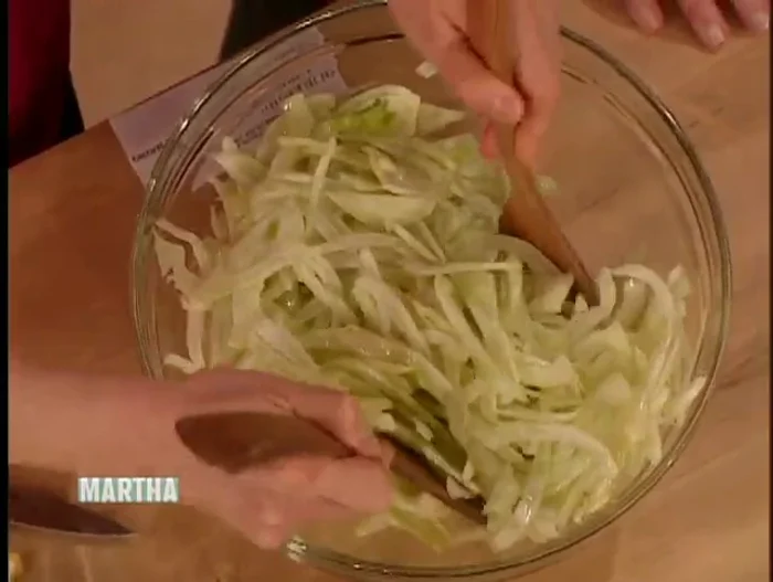Add the shaved fennel to the dressing and toss to coat. Let it marinate for about an hour.