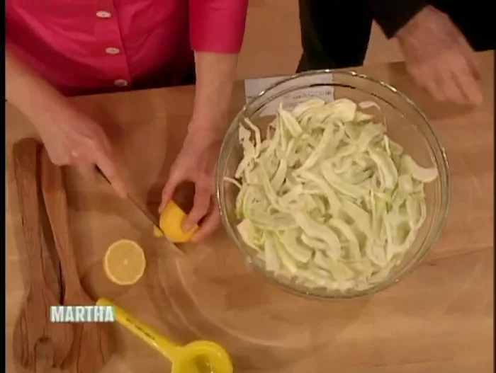 Juice the lemon using a lemon squeezer. Chop the fennel tops for garnish.
