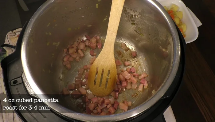 Remove vegetables from the pot. Add pancetta and roast for 3-4 minutes.