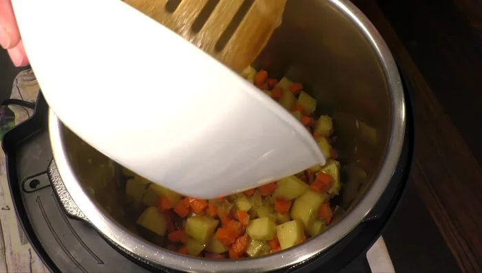 Return vegetables to the pot. Season with salt, pepper, bay leaves, and thyme.