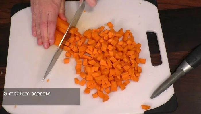 Roughly chop carrots and potatoes into chunky pieces.