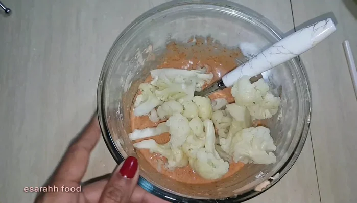 Fry the cauliflower in butter until golden brown.