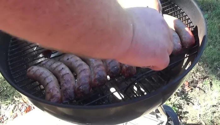 After about 20 minutes, turn the sausages. Continue cooking until they are slightly browned.