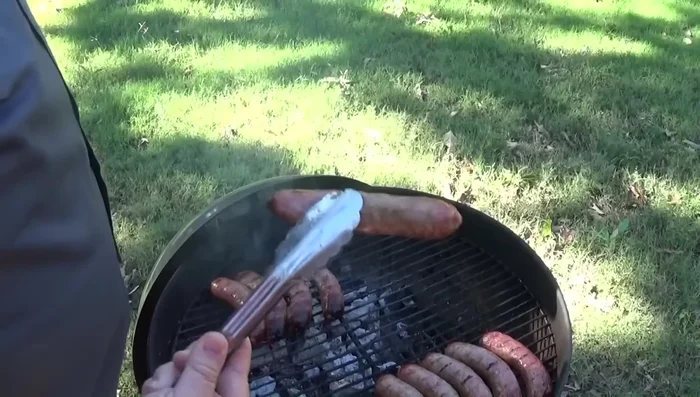 Brown the sausages: Move the sausages to the hot side of the grill to brown them on all sides. Cook for approximately 2 1/2 minutes per side.