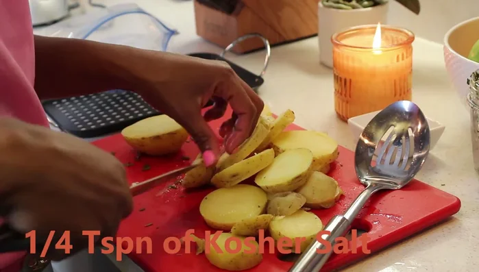 While the veal chops are grilling, toss the potatoes with olive oil, salt, and pepper.