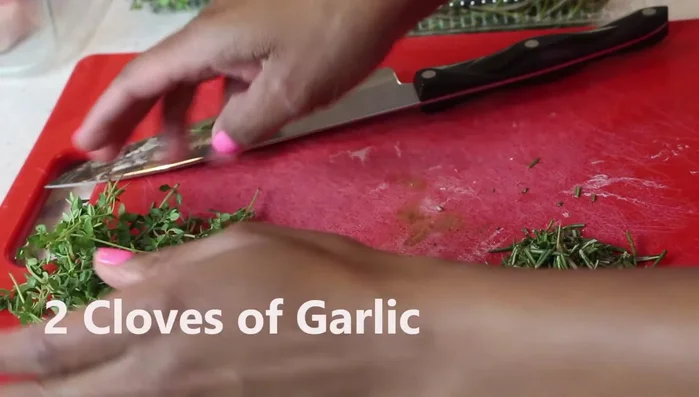 Mince one clove of garlic.