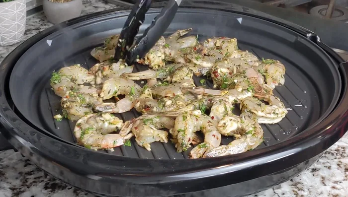 Cook for 1.5 minutes per side, or until the shrimp are pink and cooked through (about 3-4 minutes total).
