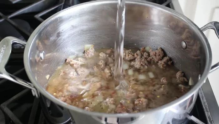 Add 6-8 cups of water (depending on desired thickness) and bring to a boil.