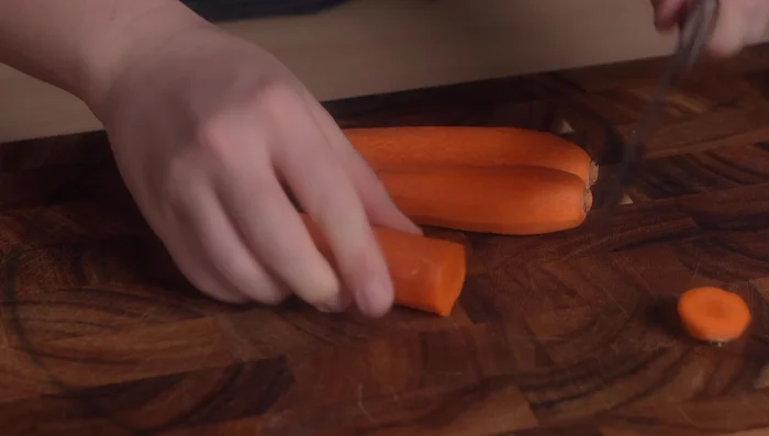 Roughly chop carrots and celery into large pieces. Finely mince the onion.