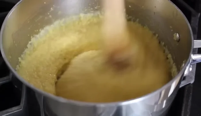 After 30 minutes, taste the polenta. If it's still gritty, continue cooking and stirring occasionally until tender.