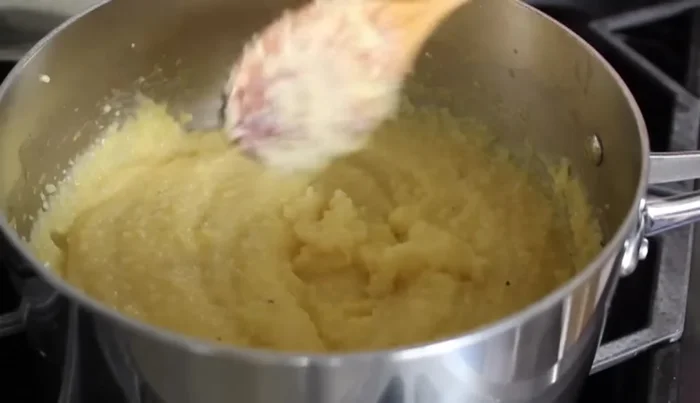 Add grated Parmesan cheese, stir until combined.