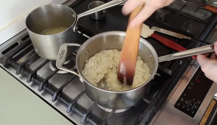 Continue stirring constantly to prevent sticking. The pan should be completely clean when done.