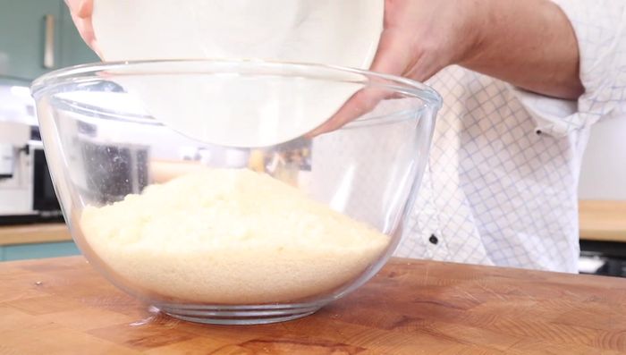 Beat the egg whites until stiff peaks form.