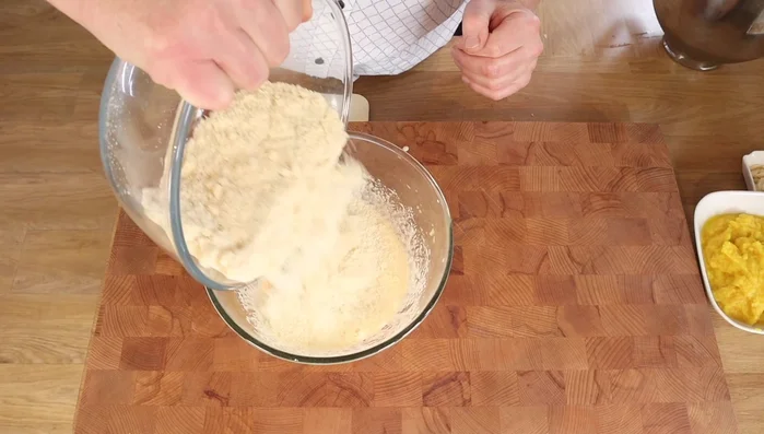 Mix ground almonds and baking powder. Gently fold this into the egg yolk mixture, followed by the orange pulp.