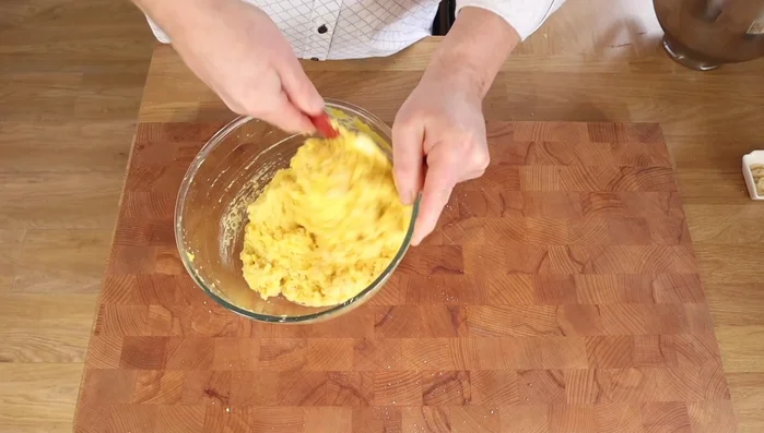 Gently fold in the whipped egg whites using a folding/cutting motion. Be careful not to deflate the egg whites.
