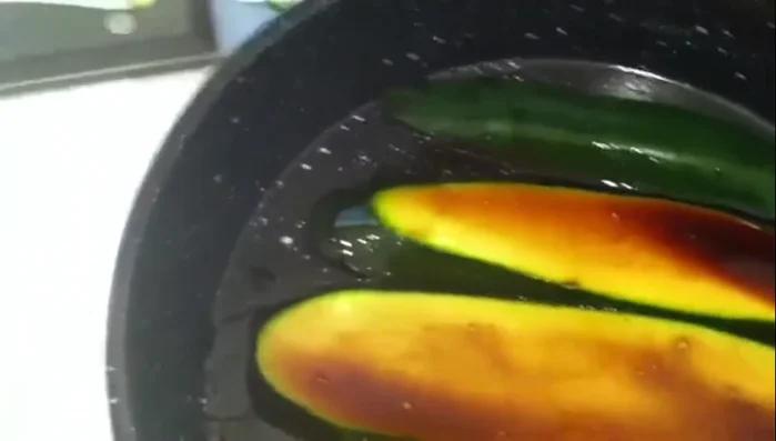 Drizzle balsamic vinegar generously over the squash layers.