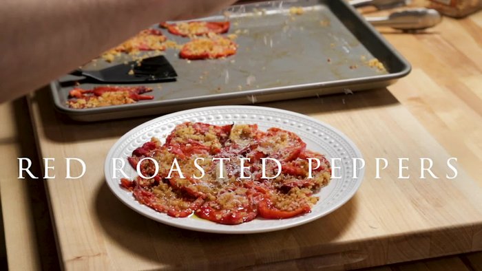 Wash and dry red peppers. Place them on parchment paper and put them in a 400-degree oven for about 60 minutes, flipping halfway.