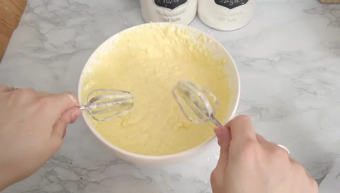 Whisk egg whites until firm peaks form. [92.56]