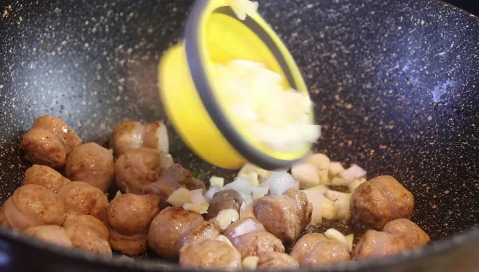 Add chopped garlic and onion, sauté until fragrant.