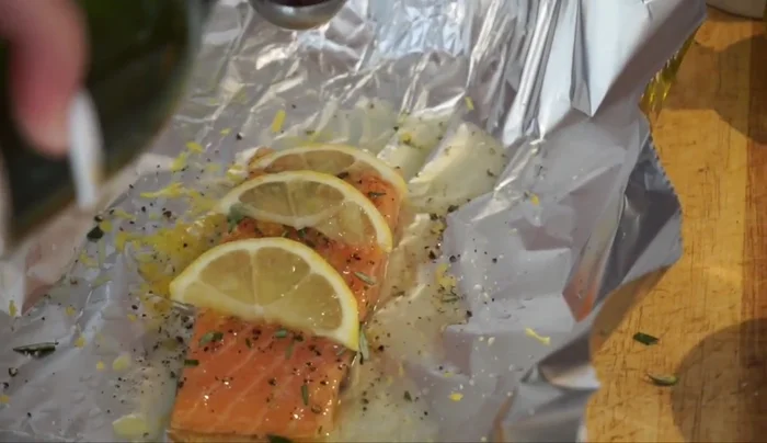 Add 2 tablespoons of Marsala wine and a few capers. Wrap salmon in foil packets.
