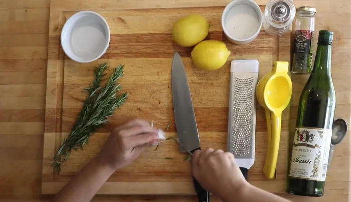 Place a grill pan over medium-high heat. Remove rosemary leaves and stems, chop roughly.