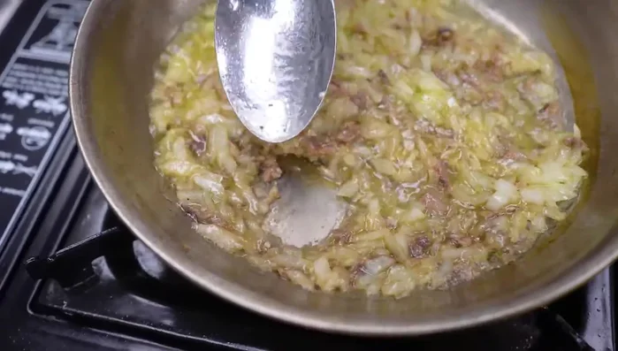 Add anchovies to the pan: Add pre-chopped anchovies to the pan. Cook until they cream up. Add vinegar, and be careful of the fumes.