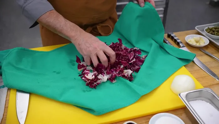 Prepare the radicchio: If wilted, submerge it in water to revive. This can keep it fresh for weeks. Cut the radicchio into bite-sized pieces.