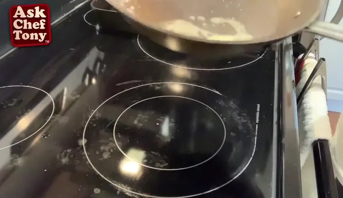 Make the sauce: In a pan, melt butter, add white wine, lemon juice (from fresh lemons or bottled), and limoncello. Reduce until slightly thickened.