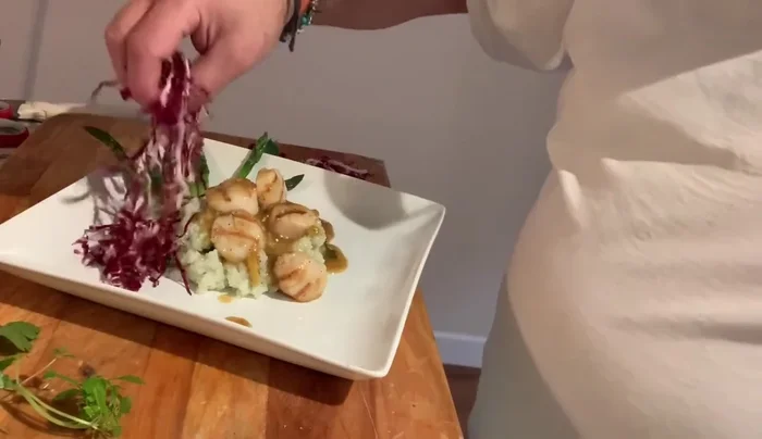 Garnish with shredded radicchio (soaked in lemon and olive oil), parsley, basil, oregano, lemon zest, and fig-infused balsamic (optional).