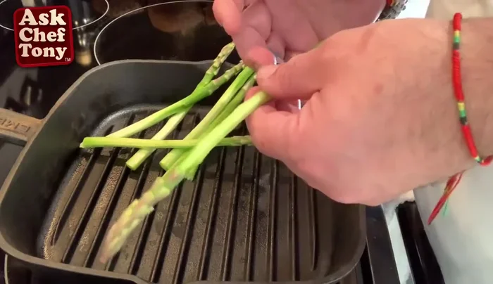 Prepare the asparagus: Peel to make it more tender.