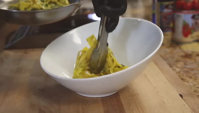 Cook pappardelle pasta in butter and herbs.