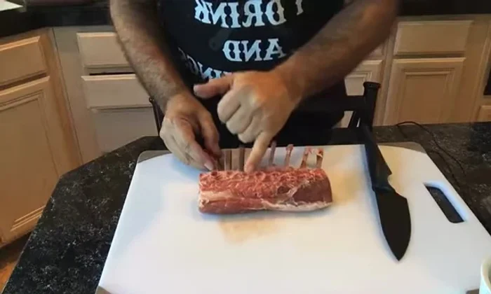 Prepare the lamb chops: If your rack of lamb hasn't been frenched (bones exposed), use a sharp knife to separate the chops, ensuring even thickness. Trim excess fat. (325.6)