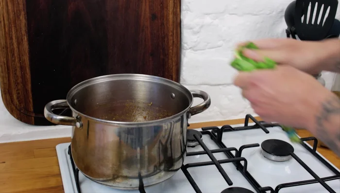 Add basil leaves and vegetable stock (1:16.0).