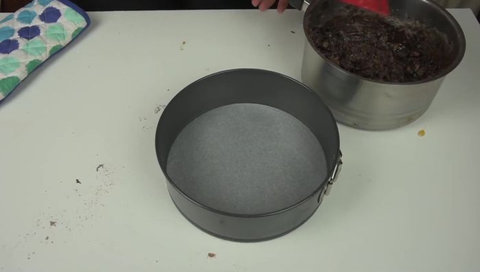 Pour the mixture into a prepared baking pan. 