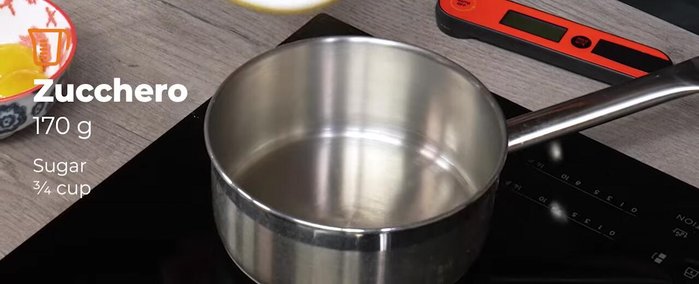Add water to a saucepan, then add sugar. Ensure the sugar absorbs the water uniformly.