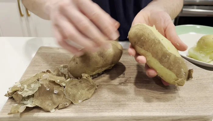 Once potatoes are cool enough to handle, peel them and rice them using a potato ricer (food mill or masher can be used).