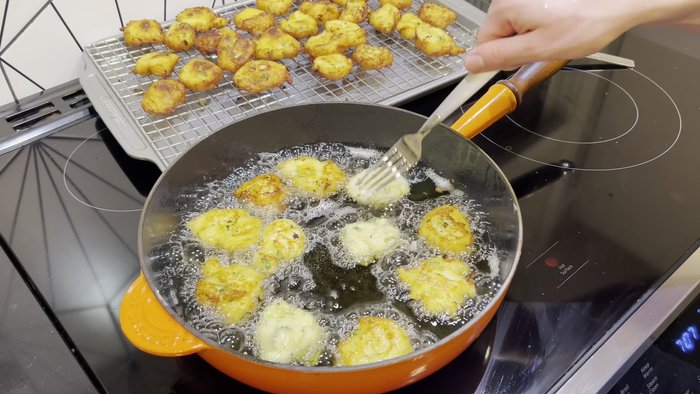 Boil 2 lbs of russet potatoes. Don't turn on the heat until potatoes are in the water to ensure even cooking. Medium-sized potatoes will take about 45 minutes. Check for doneness by easily inserting a sharp knife into the center.