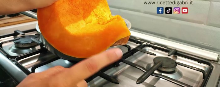 Add a slice of pumpkin, an apple (peeled or unpeeled), celery stick, salt, pepper, and fennel to the pan. The browning of these ingredients is key to a flavorful roast.