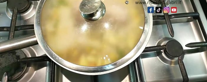 Transfer the pan to a smaller burner, cover, and cook for approximately 2.5-3 hours.