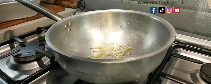 Heat olive oil in a large pan over high heat. Brown the pork roast well on all sides.