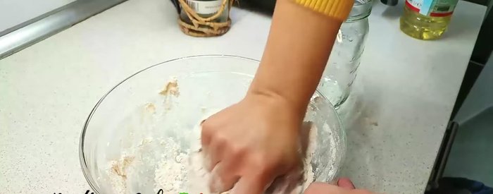 Knead the dough vigorously for several minutes until it becomes soft and easy to work with.