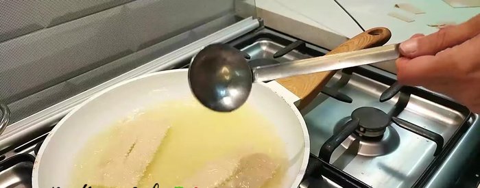 Fry the chiacchiere in hot oil until golden brown.