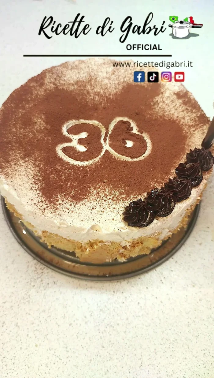 Decorate with ganache using a pastry bag and number-shaped biscuit molds (or cut out numbers from paper). Sprinkle with dark chocolate. [235.879]