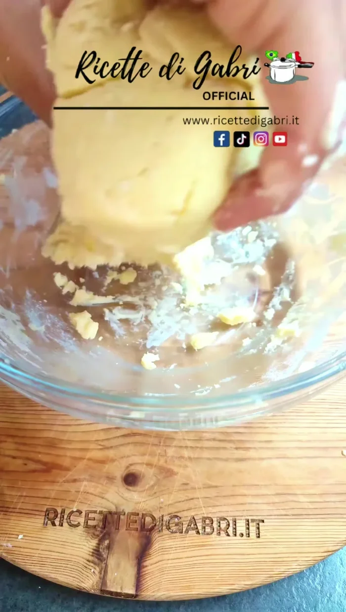Divide the dough into two parts. Color one half with bitter cocoa powder.