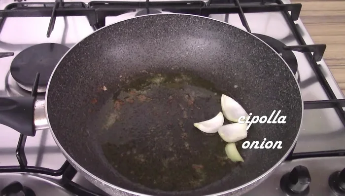 Remove chicken and set aside. In the same pan, sauté onion, then add cherry tomatoes, salt, and basil. Cook for a few minutes.
