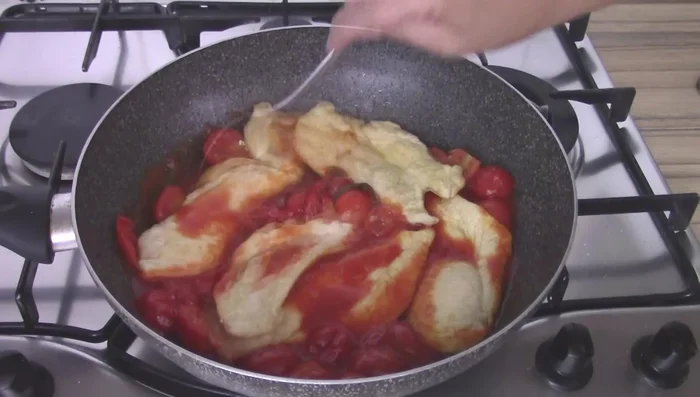 Add mozzarella and more cherry tomatoes. Cover and cook until mozzarella melts.